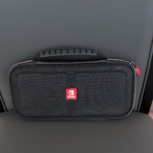 Nintendo Switch Black and Red Travel Case With Pokemon Sword Game Included